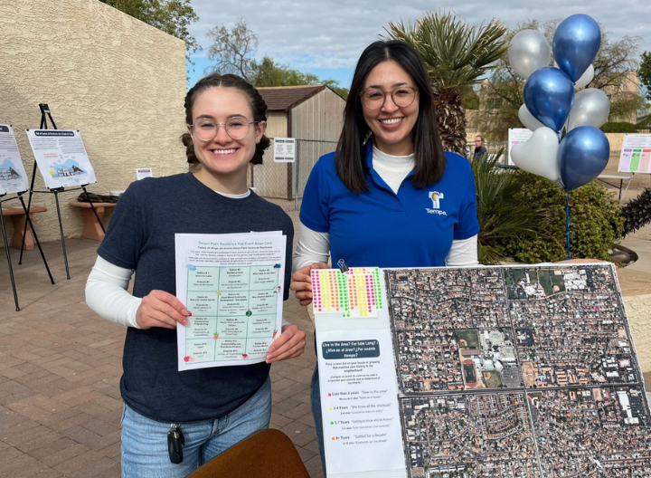 tempe employees with posters and flyers